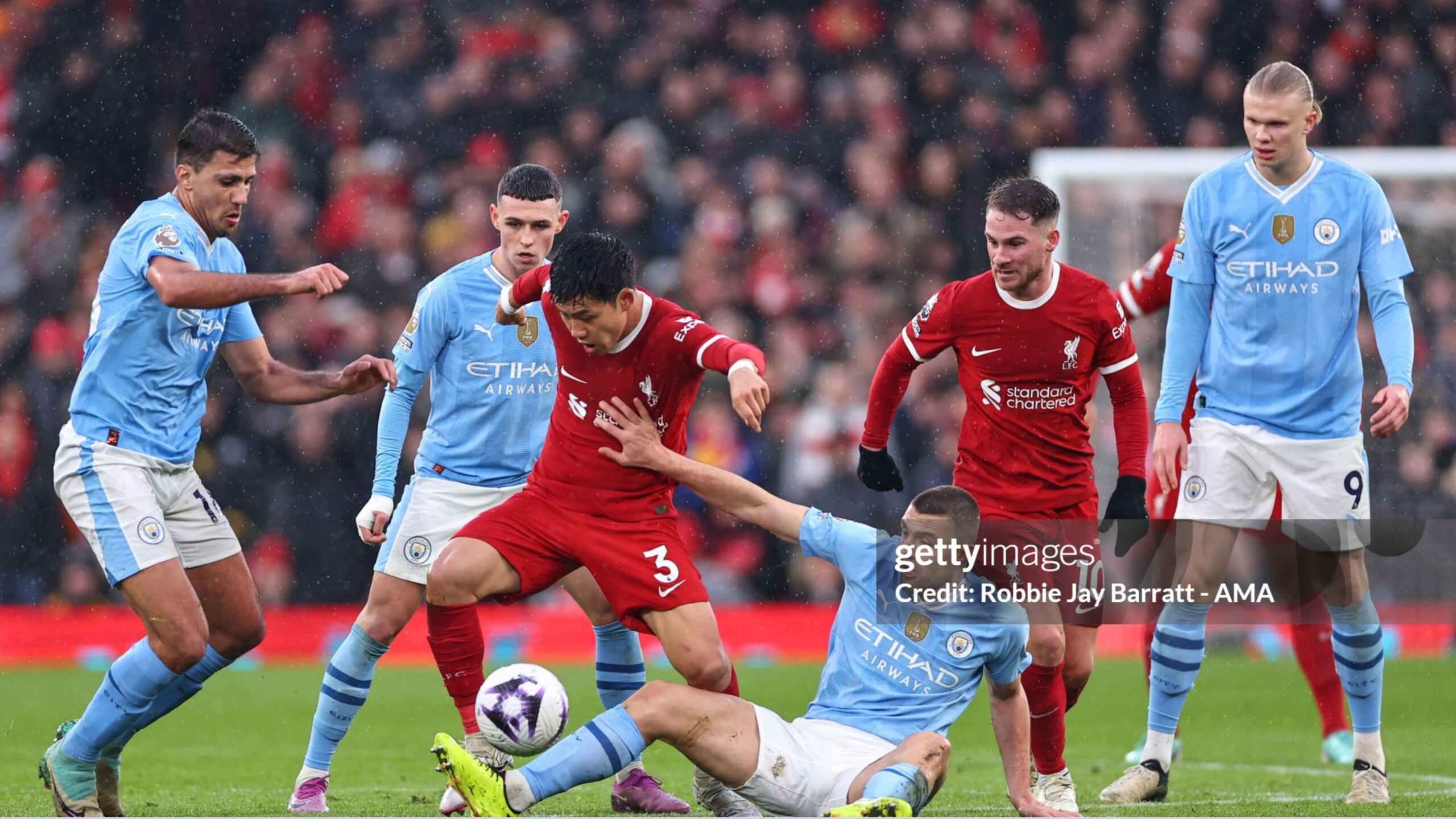 Liverpool and Manchester City players in a tense Premier League match