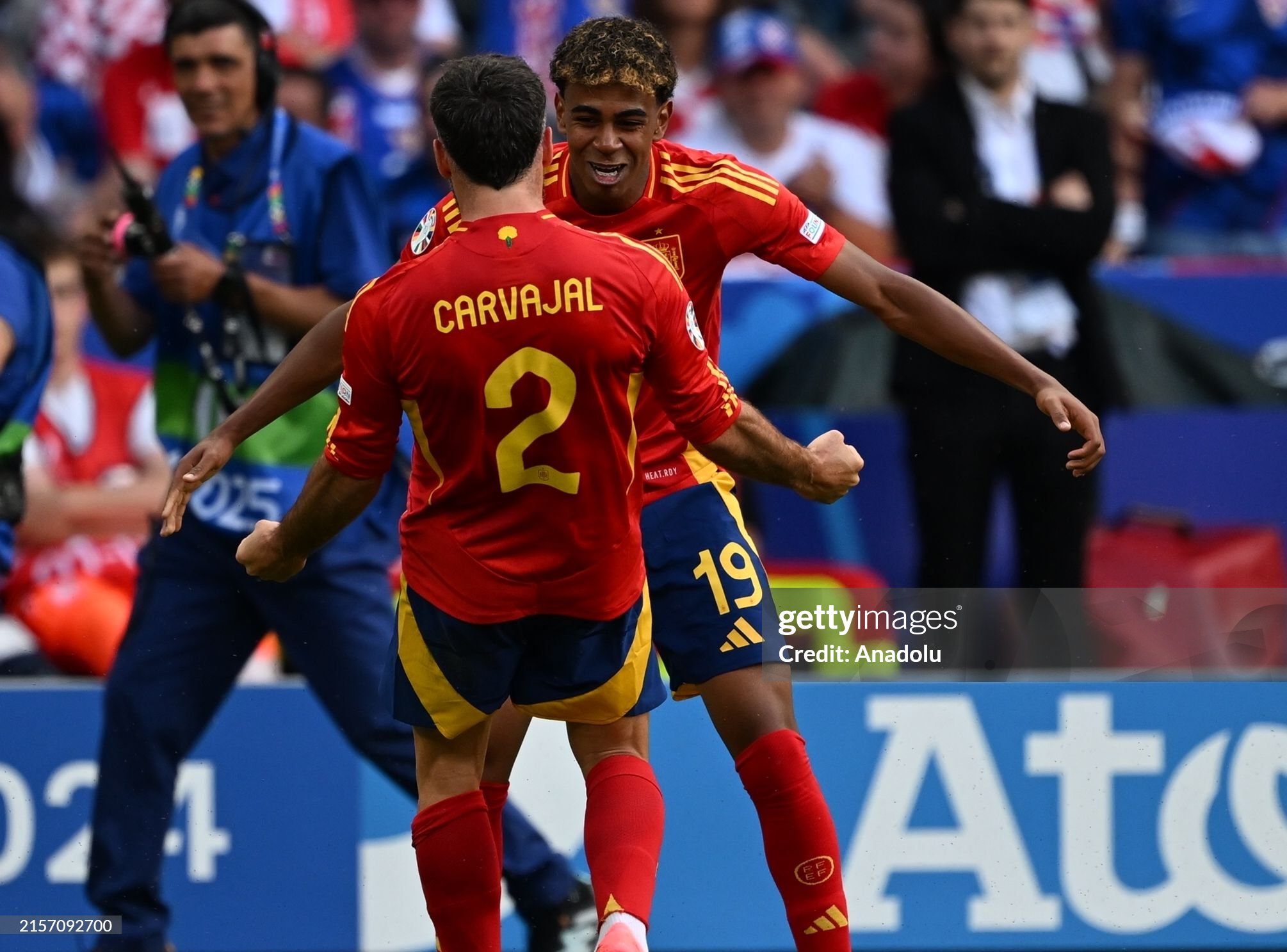 Lamine Yamal celebrates with Dani Carvajal after Spain's goal against Croatia in Euro 2024 opener.