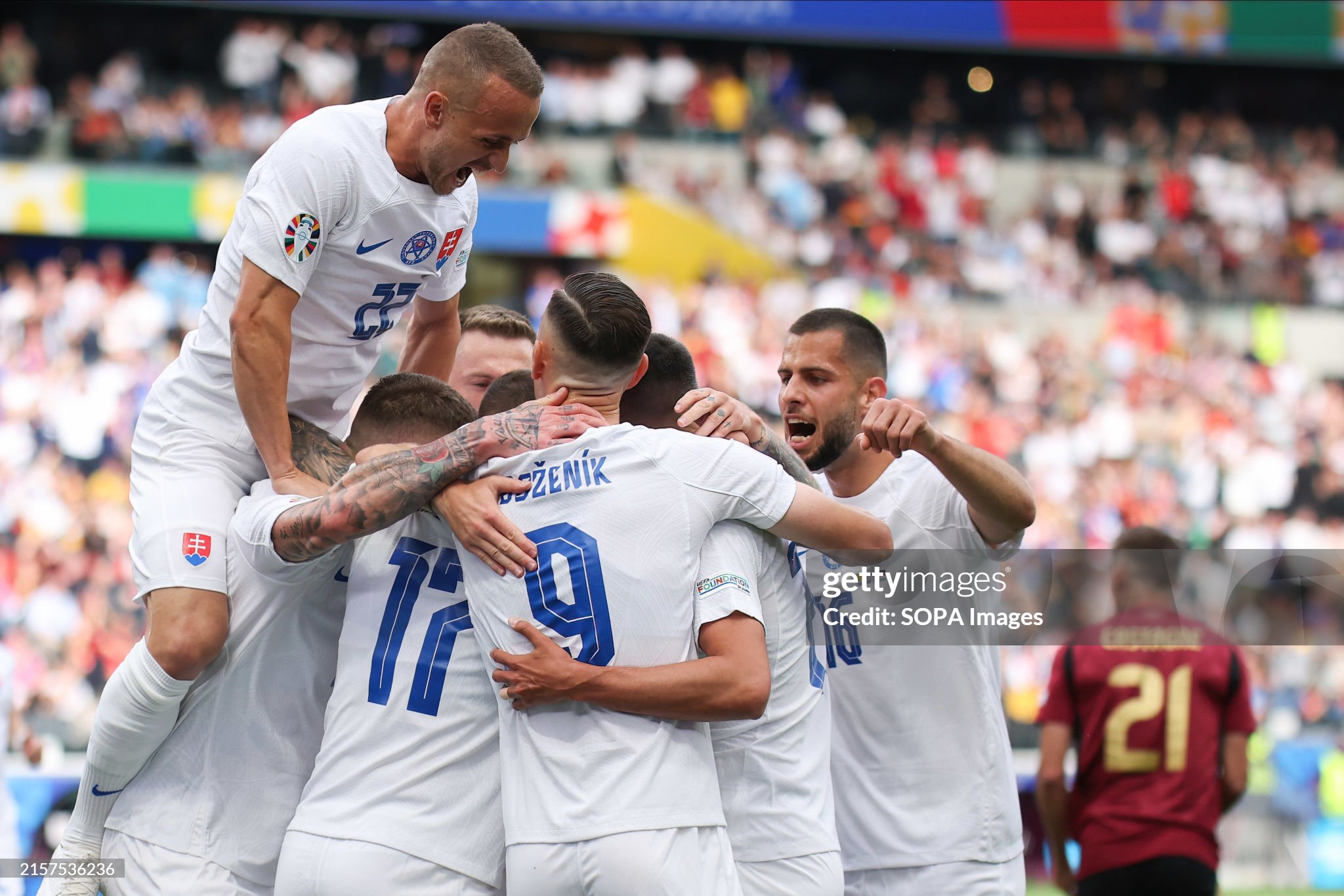 Slovakia players celebrating their 1-0 victory over Belgium in Euro 2024.