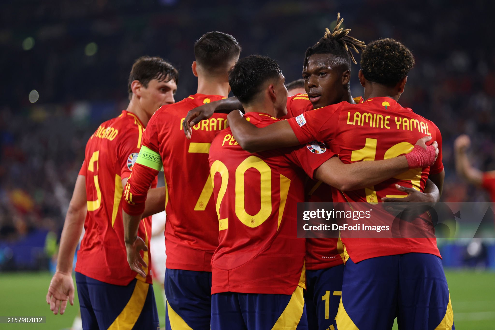 Nico Williams celebrating a dynamic play at UEFA EURO 2024, symbolizing Spain's football evolution.